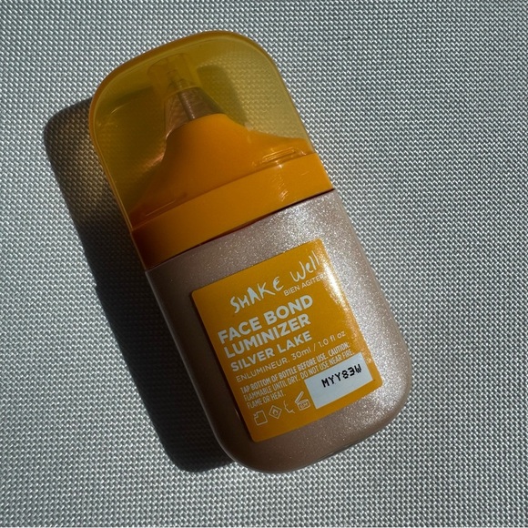 NWT Urban Decay Face Bond Luminizer Waterproof Glow Drops - Silverlake - Picture 2 of 3